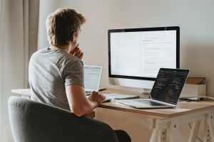 An aspiring certified programmer taking his certificate examination