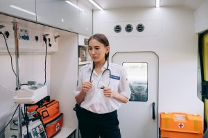 A professional paramedic standing inside Ambulance